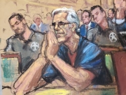 FILE - Financier Jeffrey Epstein looks on during a bail hearing in his sex-trafficking case, in this court sketch, in New York, July 15, 2019.