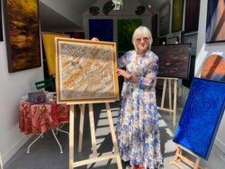Giverny-based artist Chanal Lallemand sells a lot of her work to American clients - but not this year. (Photo: Lisa Bryant/VOA)