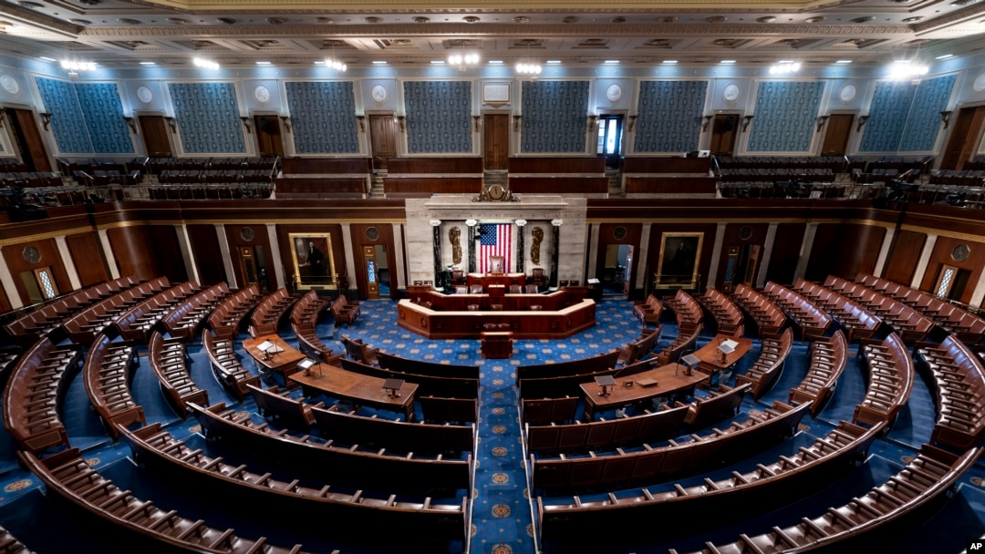 FILE - The chamber of the House of Representatives is seen at the Capitol in Washington, Feb. 28, 2022. In the 2024 elections, Republicans have won enough seats to control the U.S. House, completing the party's sweep into power.