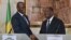 FILE—Gabon's transitional president general Brice Oligui Nguema (L) shakes hands with Ivorian President Alassane Ouattara (R) during a joint press conference at the Presidential Palace, in Abidjan on April 11, 2024.