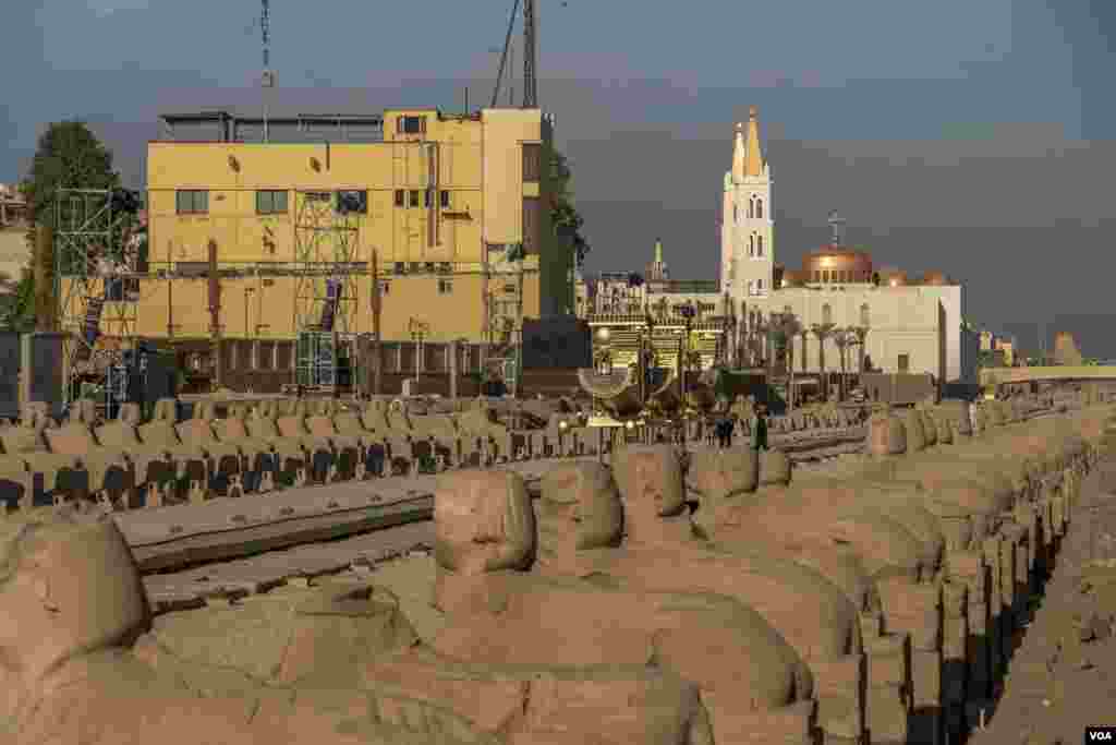 Against the backdrop of ancient Luxor, restored sphinxes await tourists on Nov. 24, 2021 in Luxor, Egypt. (VOA/Hamada Elrasam)