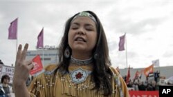 Protesters outside the conference center in London where BP held its annual general shareholder meeting, April 14, 2011