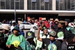 FILE—Members of uMkhonto we Sizwe (MK), sing and dance outside the High Court in support of forin support of former President Zuma in Johannesburg on April 11, 2024.