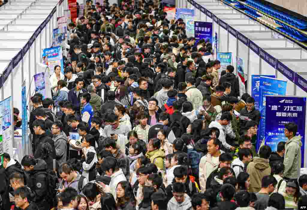 People attend a job fair in Shenyang, in northeastern China's Liaoning province, Oct. 22, 2024.