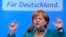 German Chancellor and top candidate of the Christian Democratic Union Angela Merkel makes a speech in the northern German town of Sankt Peter-Ording, July 19, 2013. 