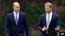 FILE - In a new book, Britain's Prince Harry says he was forced to the ground in a fight with his brother William. (Yui Mok/Pool Photo via AP, File)