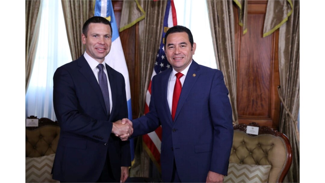 U.S. Department of Homeland Security acting Secretary Kevin McAleenan and Guatemalan President Jimmy Morales shake hands before a bilateral meeting in Guatemala City, Guatemala Aug. 1, 2019.