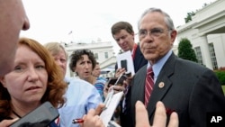 Rep. Ruben Hinojosa, speaks to reporters outside the White House, July 10, 2013, following a meeting between President Barack Obama and members of the Congressional Hispanic Caucus. 