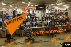 FILE - The main newsroom of Russia's Sputnik news is seen in Moscow, April 27, 2018.
