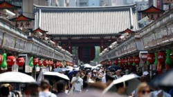 资料照片：日本东京浅草寺雷门周边街景。(2026年7月22日)