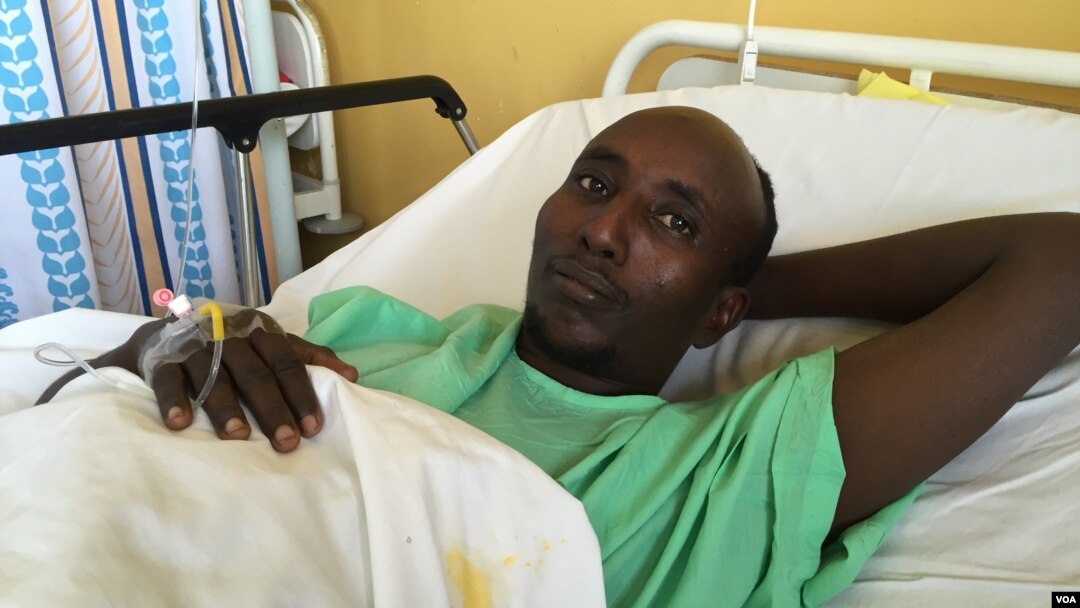 Salah Sabdow Farah was shot when the bus he was traveling in was attacked by al-Shabab militants in December 2015. He is recovering at Nairobi's Kenyatta National Hospital in January 2016.(J. Craig/VOA)