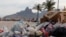 Garbage is seen on Ipanema beach in Rio de Janeiro, March 5, 2014. 