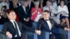 Vincent Aubin (L) and Bruno Boileau (R) react as they hold hands at their wedding ceremony at the city hall in Montpellier, May 29, 2013.