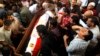 Десятки человек погибли в беспорядках на улицах Египта в пятницу