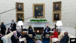 President Joe Biden, accompanied by Vice President Kamala Harris, House Democratic leaders in the Oval Office of the White House, Feb. 5, 2021.