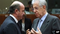 Španski i italijanski ministri finansija, Luis de Gvindos Hurado i Mario Monti