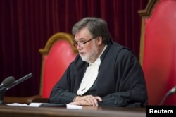 Judge Eric Leach delivers his judgement in the Oscar Pistorius case in the Supreme Court of Appeal in Bloemfontein, Dec. 3, 2015.