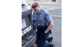 FILE - In this Monday, May 25, 2020, file frame from video provided by Darnella Frazier, a Minneapolis officer kneels on the neck of George Floyd, a handcuffed man who was pleading that he could not breathe. The death of Floyd has renewed scrutiny of immo