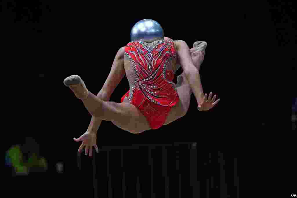 China&#39;s Zhao Yating competes with the ball in the women&#39;s rhythmic gymnastics individual all-around event during the 2018 Asian Games in Jakarta, Indonesia.