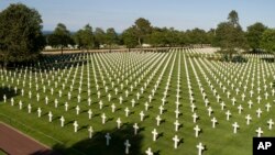 Photo taken by drone shows crosses at the American Normandy cemetery in Colleville-sur-Mer, Normandy. In the cemetery of Colleville-sur-Mer, where 9,387 fallen U.S. fighters are buried, May 28, 2019. 