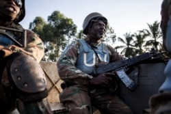 FILE - A South African soldier from the United Nations Stabilization Mission in the Democratic Republic of the Congo (MONUSCO) is seen during a patrol to hold off attacks by the Allied Democratic Forces rebels in Oicha, DRC, Oct. 08, 2018.