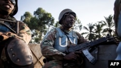 FILE - A South African soldier from the United Nations Stabilization Mission in the Democratic Republic of the Congo (MONUSCO) is seen during a patrol to hold off attacks by the Allied Democratic Forces rebels in Oicha, DRC, Oct. 08, 2018. 