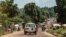 An ambulance carries the remains of an Ebola victim towards a burial site in Mbandaka on May 22, 2018, in the Democratic Republic of Congo.