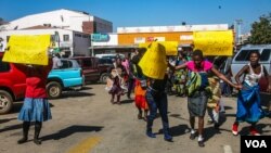 Angry vendors protest over confiscated wares outside Harare Town Hall. (Photo: Thomas Chiripasi)