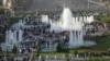 FILE - A photo shows a downtown park with fountains in Irbil, Iraqi Kurdistan's capital, during somewhat better economic times, Sept. 22, 2013.