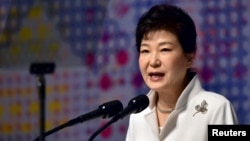 FILE - South Korean President Park Geun-hye delivers a speech during a ceremony to mark the anniversary of the 1919 independence movement against Japanese rule over the Korean peninsula, in Seoul, March 1, 2016.