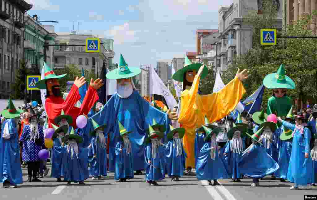 Participants attend an annual carnival to celebrate the International Children&#39;s Day, in Krasnoyarsk, Russia, June 1, 2019.