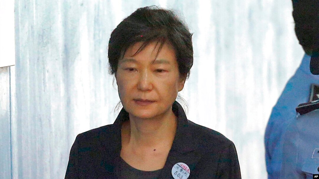 FILE - Former South Korean President Park Geun-hye arrives to attend a hearing on the extension of her detention at the Seoul Central District Court in Seoul, South Korea on Oct. 10, 2017.