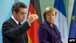 Merkel Fransız Seçimlerinde Neden Sarkozy'i Destekliyor?