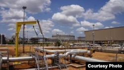 Pipelines criss-cross at the Palouge oil field in South Sudan.