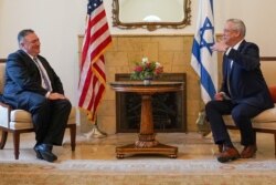 U.S. Secretary of State Mike Pompeo meets with Israeli Speaker of the Knesset Benjamin Gantz, in Israel, May 13, 2020. (Credit: State Department Photo by Ron Przysucha)
