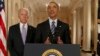 President Barack Obama, standing with Vice President Joe Biden, delivers remarks in the East Room of the White House in Washington, Tuesday, July 14, 2015, after an Iran nuclear deal is reached. (AP Photo/Andrew Harnik, Pool)