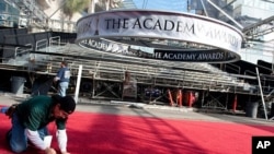 The Red Carpet for the 83rd Academy Awards is rolled out on Hollywood Blvd outside the Hollywood and Highland Center in Hollywood, California, February 23, 2011