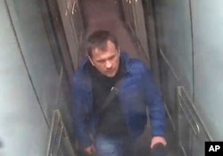 FILE - A still image taken from CCTV and issued by the Metropolitan Police in London Sept. 5, 2018, shows a man then identified as Alexander Petrov at Gatwick airport, England, March 2, 2018.