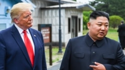 Predsednik SAD Donald Tramp i severnokorejski lider Kim Džong Un tokom sastanka u Singapuru, 12. jun 2018. godine (Foto: KCNA)