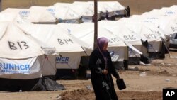 Una mujer iraquí en un campo de refugiados en Khazir.