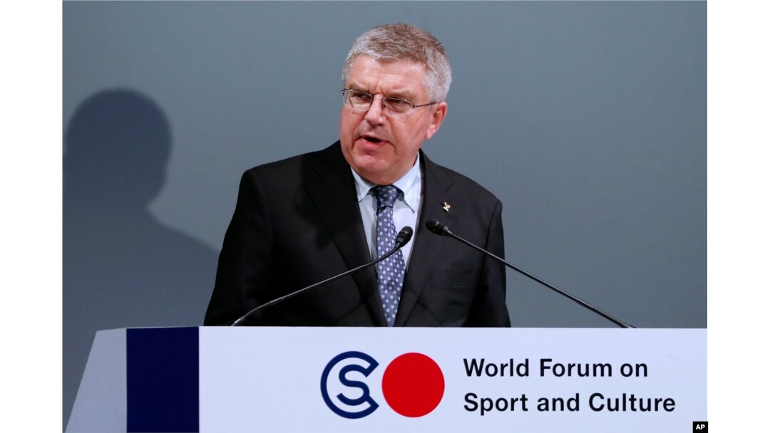 FILE - In this Oct. 20, 2016, photo, International Olympic Committee President Thomas Bach delivers a speech at World Forum on Sports and Culture in Tokyo.