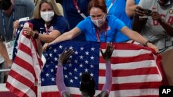 Athing Mu of United States celebrates after winning the final of the women&#39;s 800-meters at the 2020 Summer Olympics in Tokyo, Japan.