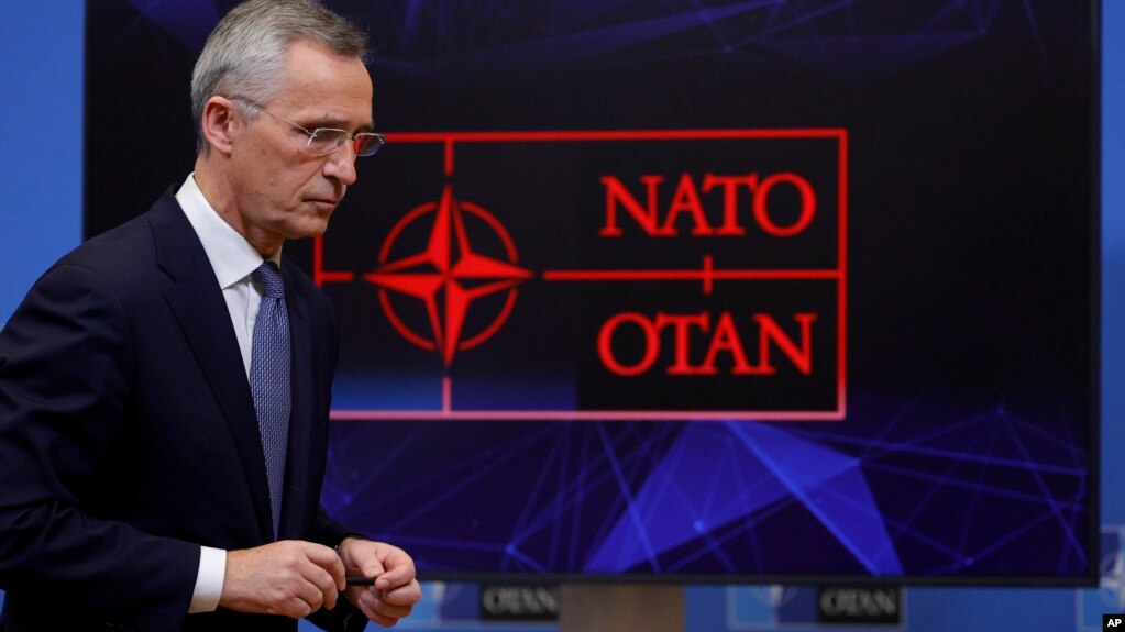 FILE - NATO Secretary General Jens Stoltenberg leaves after speaking at a media conference at NATO headquarters, in Brussels, Belgium, Jan. 12, 2022.