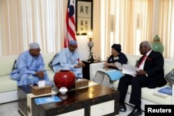 FILE - Mohammed Ibn Chambas, Special Representative of the Secretary-General and Head of the United Nations Office for West Africa, meets with West African leaders during Gambia election crisis mediation in Banjul, Dec. 13, 2016.