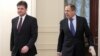 Russia's Foreign Minister Sergei Lavrov (R) and Slovak Foreign Minister Miroslav Lajcak take a walk during their meeting in Moscow, Russia, December 12, 2012. (AP)
