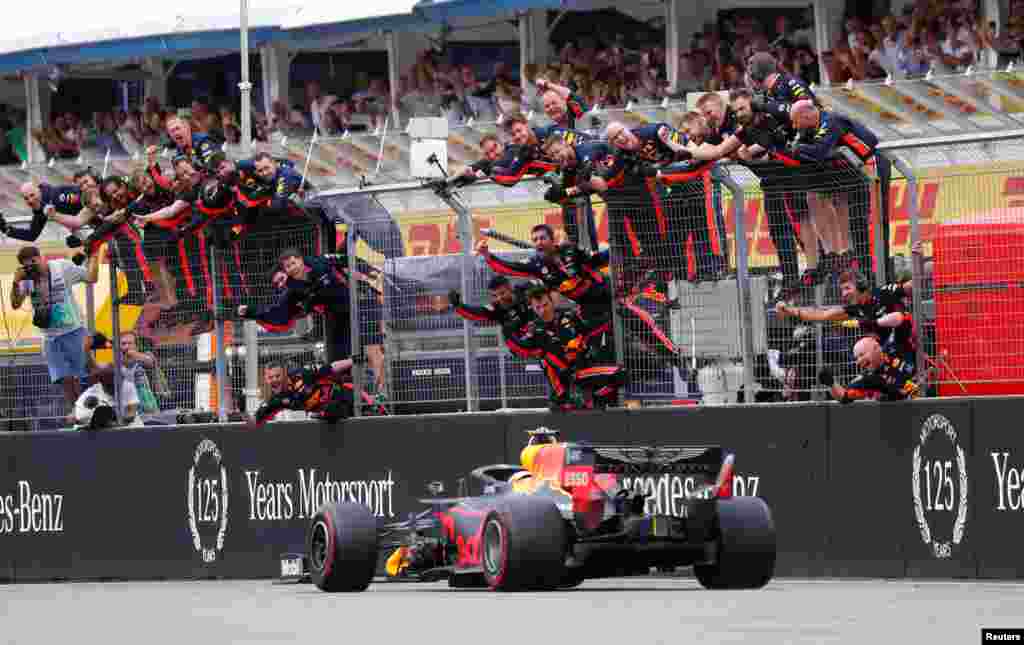 Red Bull&#39;s Max Verstappen crosses the line to win the German Formula One Grand Prix at the Hockenheim racing circuit in Hockenheim, southern Germany.