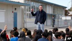 In this Monday Oct. 7, 2019 file photo, California Gov. Gavin Newsom talking to students during his visit to the Ethel I. Baker Elementary School in Sacramento, Calif.