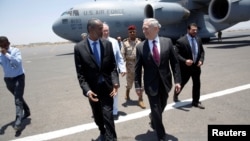 U.S. Defense Secretary Jim Mattis is greeted by Djibouti's Minister of Defense Ali Hasan Bahdon as he arrives at Djibouti-Ambouli International Airport in Ambouli, Djibouti, April 23, 2017. 