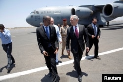 FILE - U.S. Defense Secretary James Mattis is greeted by Djibouti's minister of defense, Ali Hasan Bahdon, as he arrives at Djibouti-Ambouli International Airport in Ambouli, Djibouti, April 23, 2017.