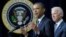 President Barack Obama, accompanied by Vice President Joe Biden, gestures as he talks about proposals to reduce gun violence, Jan. 16, 2013, at the White House.